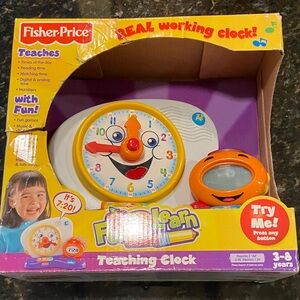 Fisher-Price Interactive Teaching Clock - Yellow, Orange, White. NIB